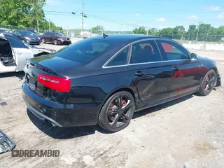 2013 Audi S6 Prestige z VIN WAUF2AFC9DN157673, wystawiony jako IAAI lot #42200162 z przebiegiem 129 670 mil mil oraz . Historia ofert i sprzedaży dostępna na DreamBid. Obrazek 4.