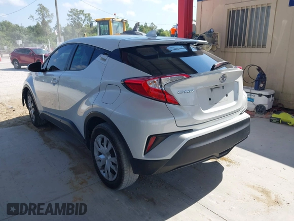 2019 Toyota C-HR XLE with VIN NMTKHMBX2KR087529, listed as a IAAI auction lot 42165493 with 130,053 mi miles and . Bid and sale history available at DreamBid. Image 3.