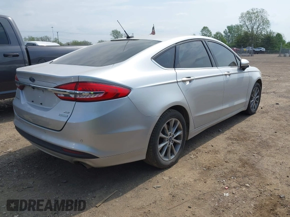 2017 Ford Fusion SE z VIN 3FA6P0HD0HR129175, wystawiony jako IAAI lot #42126532 z przebiegiem 120 424 mil mil oraz . Historia ofert i sprzedaży dostępna na DreamBid. Obrazek 4.