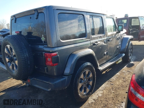 2018 Jeep Wrangler Unlimited Sahara with VIN 1C4HJXEN5JW203879, listed as a IAAI auction lot 41131467 with 87,065 mi miles and . Bid and sale history available at DreamBid. Image 4.