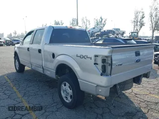 2014 Ford F-150 XL with VIN 1FTFW1EF9EKF99892, listed as a IAAI auction lot 41428456 with 128,659 mi miles and . Bid and sale history available at carsss.com. Image 3.