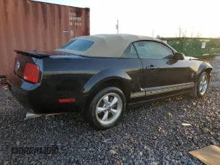 2008 Ford Mustang Deluxe with VIN 1ZVHT84N985180475, listed as a Copart auction lot 87002774 with 124,015 mi miles and Salvage Title. Bid and sale history available at carsss.com. Image 3.
