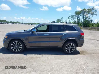 2017 Jeep Grand Cherokee Overland with VIN 1C4RJFCG2HC641791, listed as a IAAI auction lot 42566654 with 116,764 mi miles and . Bid and sale history available at DreamBid. Image 14.