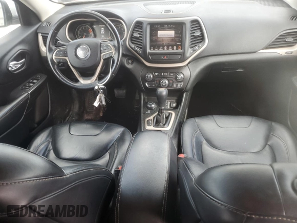 2016 Jeep Cherokee Limited with VIN 1C4PJMDS3GW310598, listed as a Copart auction lot 57182065 with 123,602 mi miles and Salvage title. Bid and sale history available at DreamBid. Image 8.