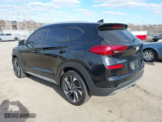 2021 Hyundai Tucson Sport with VIN KM8J3CAL6MU411855, listed as a IAAI auction lot 41694634 with 67,779 mi miles. Bid and sale history available at carsss.com. Image 3.
