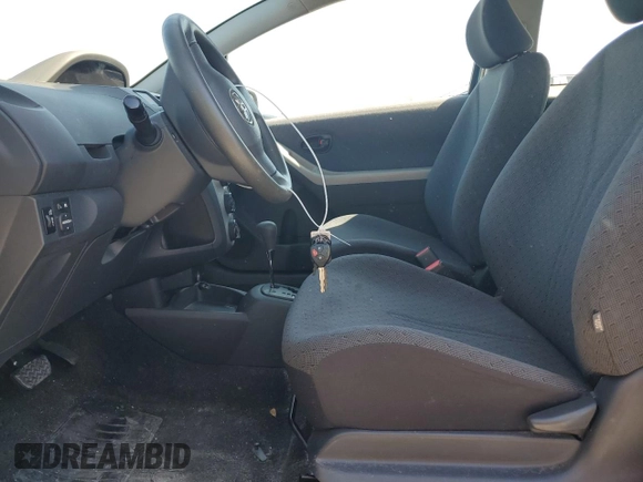 2011 Toyota Yaris with VIN JTDJT4K35B5330328, listed as a Copart auction lot 46904665 with 107,100 mi miles and Salvage Title. Bid and sale history available at carsss.com. Image 7.