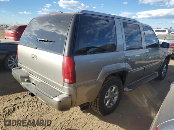2000 Cadillac Escalade z VIN 1GYEK63R3YR218500, wystawiony jako Copart lot #77676354 z przebiegiem 164 602 mil mil oraz Czysty tytuł • Clean title. Historia ofert i sprzedaży dostępna na DreamBid. Obrazek 3.