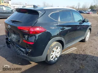 2019 Hyundai Tucson Value with VIN KM8J3CA41KU066384, listed as a IAAI auction lot 41524315 with 52,903 mi miles. Bid and sale history available at carsss.com. Image 4.