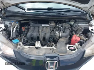 2015 Honda Fit LX with VIN 3HGGK5H52FM774019, listed as a IAAI auction lot 42614477 with 270,129 mi miles and . Bid and sale history available at DreamBid. Image 10.