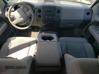 2007 Ford F-150 STX with VIN 1FTRX12W57FB31037, listed as a Copart auction lot 50779865 with 262,572 mi miles and Salvage Title. Bid and sale history available at DreamBid. Image 8.