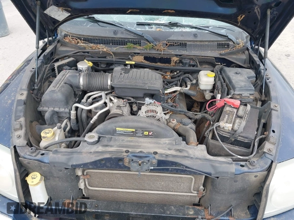 2005 Dodge Dakota Laramie with VIN 1D7HW58NX5S227633, listed as a IAAI auction lot 42122619 with 85,338 mi miles and . Bid and sale history available at DreamBid. Image 10.
