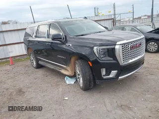 2023 GMC Yukon XL Denali with VIN 1GKS2JKL9PR553028, listed as a IAAI auction lot 40990734 with 35,564 mi miles. Bid and sale history available at carsss.com. Image 1.