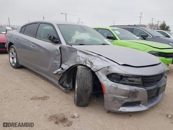 2018 Dodge Charger R/T with VIN 2C3CDXCTXJH148030, listed as a IAAI auction lot 41225873 with 105,069 mi miles. Bid and sale history available at carsss.com. Image 1.