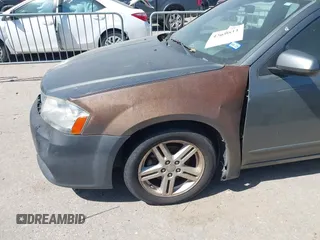 2013 Dodge Avenger SXT with VIN 1C3CDZCB8DN562180, listed as a IAAI auction lot 42000811 with 207,872 mi miles and . Bid and sale history available at carsss.com. Image 6.
