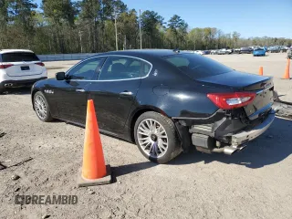 2014 Maserati Quattroporte S Q4 z VIN ZAM56RRA3E1123518, wystawiony jako Copart lot #49866795 z przebiegiem 89 889 mil mil oraz Szkody całkowita. Historia ofert i sprzedaży dostępna na DreamBid. Obrazek 2.