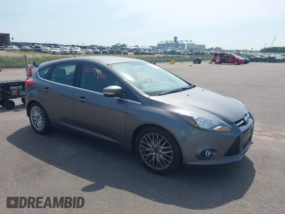 2014 Ford Focus Titanium with VIN 1FADP3N26EL453107, listed as a IAAI auction lot 42745891 with 148,743 mi miles and . Bid and sale history available at DreamBid. Image 1.