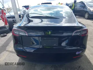 2019 Tesla Model 3 Mid Range with VIN 5YJ3E1EA3KF325056, listed as a IAAI auction lot 41771543 with 183,157 mi miles and . Bid and sale history available at carsss.com. Image 16.