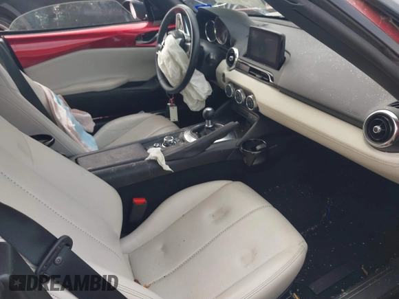 2021 Mazda MX-5 Miata Grand Touring with VIN JM1NDAD79M0454079, listed as a IAAI auction lot 41230199 with 104,783 mi miles and . Bid and sale history available at DreamBid. Image 5.