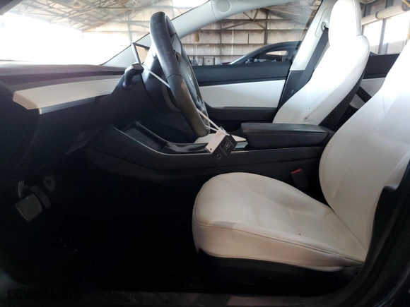 2020 Tesla Model 3 Standard Range Plus with VIN 5YJ3E1EA7LF614913, listed as a Copart auction lot 48518555 with 121,482 mi miles and Salvage Title. Bid and sale history available at carsss.com. Image 7.