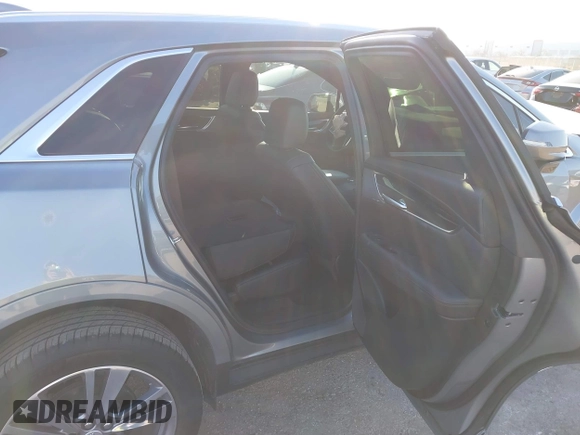 2025 Cadillac XT5 FWD Premium Luxury with VIN 1GYKNCRS7SZ104526, listed as a IAAI auction lot 41468623 with 3,896 mi miles. Bid and sale history available at carsss.com. Image 8.