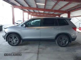 2019 Honda Passport EX-L with VIN 5FNYF7H58KB001928, listed as a IAAI auction lot 41862168 with 102,743 mi miles and . Bid and sale history available at carsss.com. Image 15.