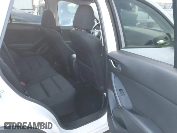 2014 Mazda CX-5 Touring with VIN JM3KE2CY8E0321578, listed as a IAAI auction lot 41769930 with 101,724 mi miles. Bid and sale history available at carsss.com. Image 8.