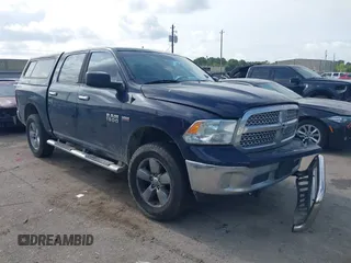 2014 Ram 1500 Big Horn with VIN 1C6RR6LT1ES390373, listed as a IAAI auction lot 42328956 with 303,185 mi miles and . Bid and sale history available at DreamBid. Image 1.