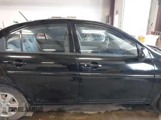 2011 Hyundai Accent GLS z VIN KMHCN4AC1BU620314, wystawiony jako IAAI lot #42228847 z przebiegiem 144 313 mil mil oraz . Historia ofert i sprzedaży dostępna na DreamBid. Obrazek 13.