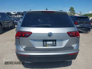 2020 Volkswagen Tiguan SE with VIN 3VV3B7AX8LM077472, listed as a IAAI auction lot 41933521 with 52,028 mi miles and . Bid and sale history available at DreamBid. Image 16.