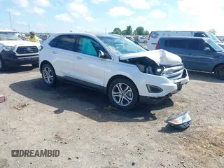 2015 Ford Edge Titanium z VIN 2FMTK3K85FBC07000, wystawiony jako IAAI lot #42225352 z przebiegiem 240 122 mil mil oraz . Historia ofert i sprzedaży dostępna na DreamBid. Obrazek 1.