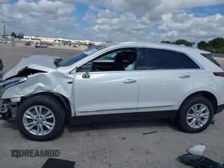 2021 Cadillac XT5 FWD Luxury with VIN 1GYKNAR40MZ146268, listed as a IAAI auction lot 41522802 with 61,775 mi miles. Bid and sale history available at carsss.com. Image 15.