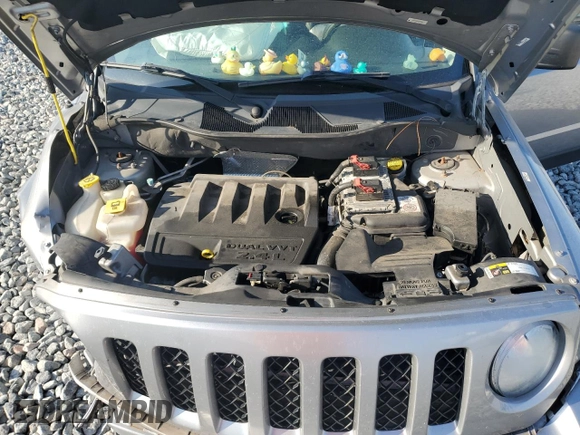 2014 Jeep Patriot Latitude with VIN 1C4NJRFB9ED759908, listed as a Copart auction lot 63874905 with 61,960 mi miles and Salvage title. Bid and sale history available at DreamBid. Image 12.