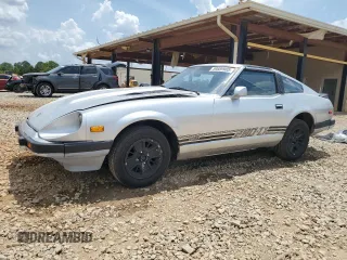 1982 Datsun 280ZX z VIN JN1HZ04S1CX455622, wystawiony jako Copart lot #59889985 z przebiegiem 239 407 mil mil oraz Czysty tytuł • Clean title. Historia ofert i sprzedaży dostępna na DreamBid. Obrazek 1.