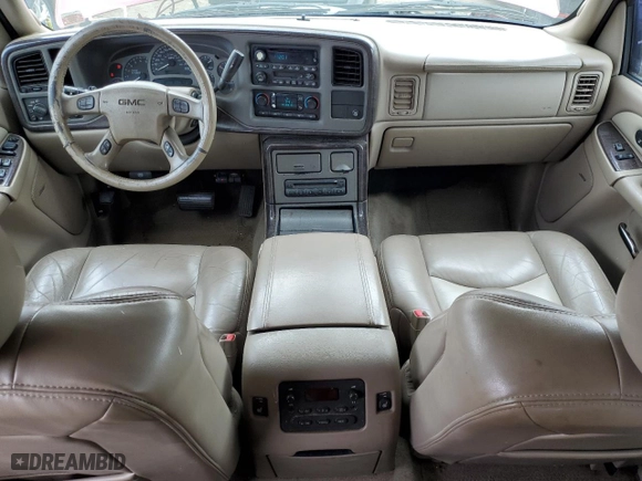 2004 GMC Yukon Denali with VIN 1GKEK63U94J135340, listed as a Copart auction lot 74230534 with 164,235 mi miles and Salvage Title. Bid and sale history available at carsss.com. Image 8.