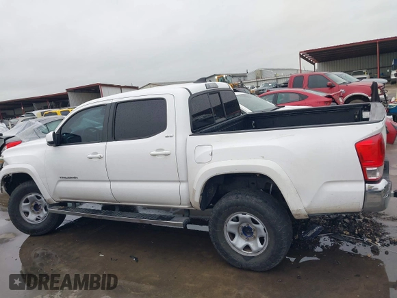 2017 Toyota Tacoma SR5 with VIN 5TFAZ5CN2HX034555, listed as a IAAI auction lot 41890292 with 133,465 mi miles and . Bid and sale history available at DreamBid. Image 14.