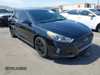 2019 Hyundai Sonata Sport z VIN 5NPE34AF2KH792374, wystawiony jako IAAI lot #41987740 z przebiegiem 77 209 mil mil oraz . Historia ofert i sprzedaży dostępna na DreamBid. Obrazek 1.