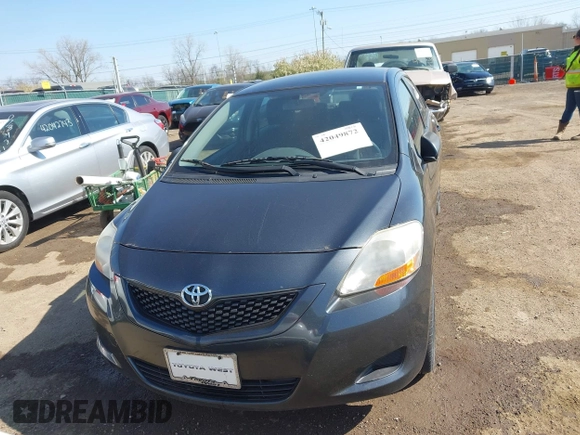 2009 Toyota Yaris with VIN JTDBT903194047784, listed as a IAAI auction lot 42049872 with 115,735 mi miles. Bid and sale history available at carsss.com. Image 12.