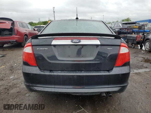 2012 Ford Fusion SEL z VIN 3FAHP0JA1CR393751, wystawiony jako Copart lot #58041345 z przebiegiem 103 092 mil mil oraz Tytuł czysty. Historia ofert i sprzedaży dostępna na DreamBid. Obrazek 6.
