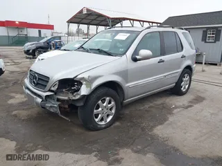 1999 Mercedes-Benz M-Class with VIN 4JGAB72E4XA113675, listed as a IAAI auction lot 41554604 with 230,092 mi miles. Bid and sale history available at carsss.com. Image 19.