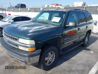 2002 Chevrolet Tahoe LS with VIN 1GNEC13V12R166916, listed as a IAAI auction lot 42393123 with 228,687 mi miles and . Bid and sale history available at DreamBid. Image 2.
