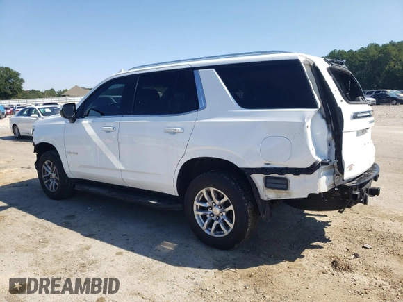 2021 Chevrolet Tahoe LT with VIN 1GNSCNKD4MR252131, listed as a Copart auction lot 69876114 with 99,192 mi miles and Salvage title. Bid and sale history available at DreamBid. Image 2.
