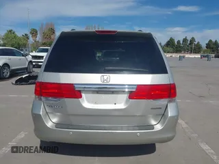 2009 Honda Odyssey Touring с VIN 5FNRL38969B013708, выставлен на аукционе IAAI как лот 42002538 с пробегом 198 220 миль миль и . История ставок и продаж доступна на DreamBid. Изображение 16.