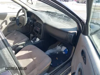 2000 Saturn SL z VIN 1G8ZH5280YZ223608, wystawiony jako IAAI lot #41377752 z przebiegiem 180 857 mil mil oraz . Historia ofert i sprzedaży dostępna na DreamBid. Obrazek 5.