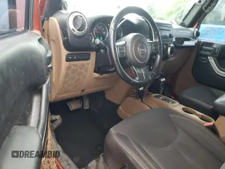 2014 Jeep Wrangler Rubicon with VIN 1C4BJWCG2EL303420, listed as a Copart auction lot 63550985 with 87,175 mi miles and Salvage title. Bid and sale history available at DreamBid. Image 8.