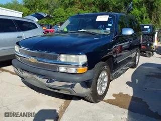 2004 Chevrolet Tahoe LT with VIN 1GNEC13Z64R186097, listed as a IAAI auction lot 42035901 with 285,408 mi miles. Bid and sale history available at carsss.com. Image 2.