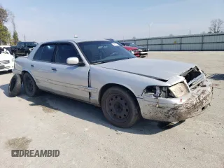 2003 Ford Police Interceptor Street Appear with VIN 2FAFP71WX3X110275, listed as a Copart auction lot 44157665 with 275,661 mi miles and Salvage title. Bid and sale history available at DreamBid. Image 4.