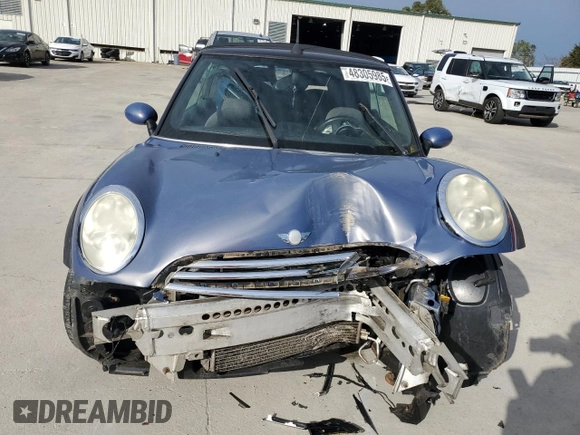 2005 MINI Convertible with VIN WMWRF33555TF62593, listed as a Copart auction lot 48305985 with 172,839 mi miles and Salvage title. Bid and sale history available at DreamBid. Image 5.
