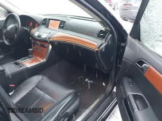 2006 Infiniti M z VIN JNKAY01E46M114297, wystawiony jako IAAI lot #41301675 z przebiegiem 199 013 mil mil oraz . Historia ofert i sprzedaży dostępna na DreamBid. Obrazek 5.