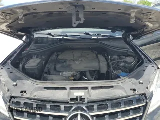 2013 Mercedes-Benz M 350 with VIN 4JGDA5JB1DA158693, listed as a Copart auction lot 60065005 with 98,896 mi miles and Salvage title. Bid and sale history available at DreamBid. Image 12.