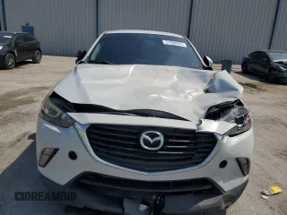 2017 Mazda CX-3 Touring z VIN JM1DKDC75H0168823, wystawiony jako Copart lot #57968955 z przebiegiem 116 231 mil mil oraz Szkoda całkowita • Salvage title. Historia ofert i sprzedaży dostępna na DreamBid. Obrazek 5.